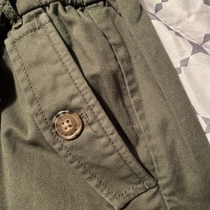 Loft green skirt with elastic band and tie.